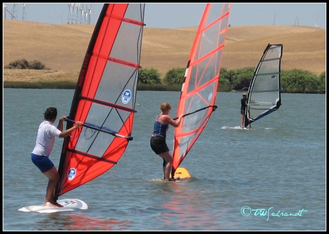 Three new windsurfers enjoying a light-wind day