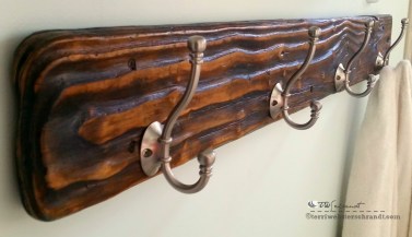 Lowly 2x6 board abandoned at the delta gets re-purposed into bathroom towel rack 