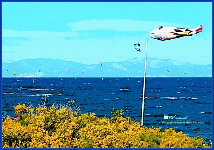 A flying windsock promises wind for kite surfing