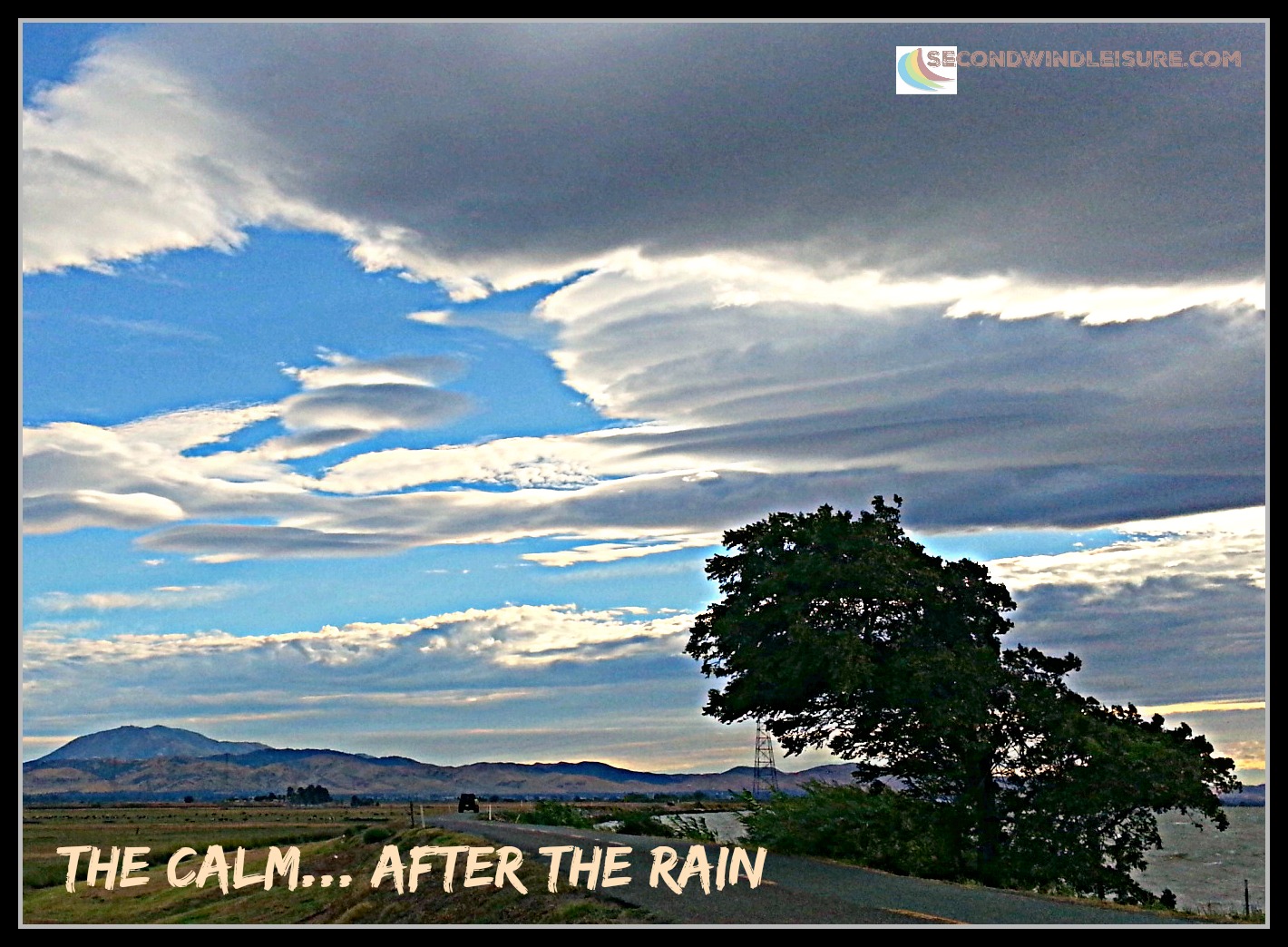 Lenticular clouds curve over the delta after a summer storm.