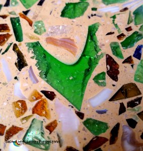 The green bits in the terrazzo floor are crushed, recycled Heineken beer bottles.