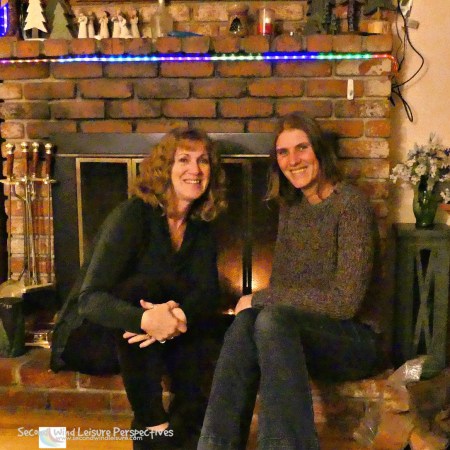 Terri and Liesbet enjoy a warm fire