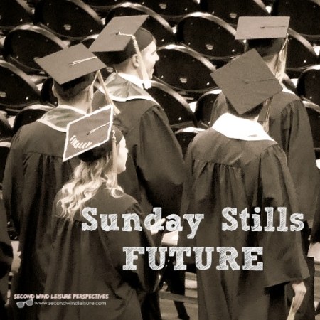 College graduates walk at commencement