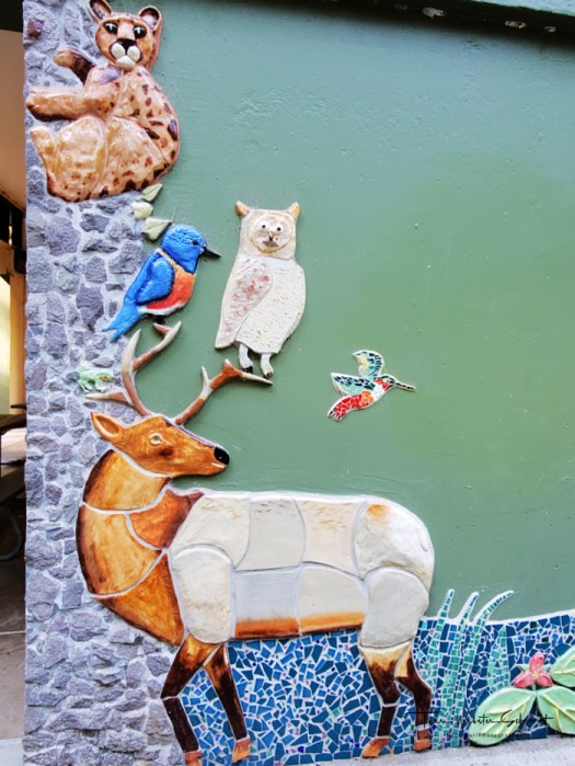 Deer, birds, cougar mural
