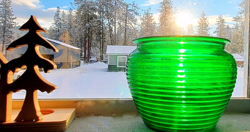 Green vase in transom window