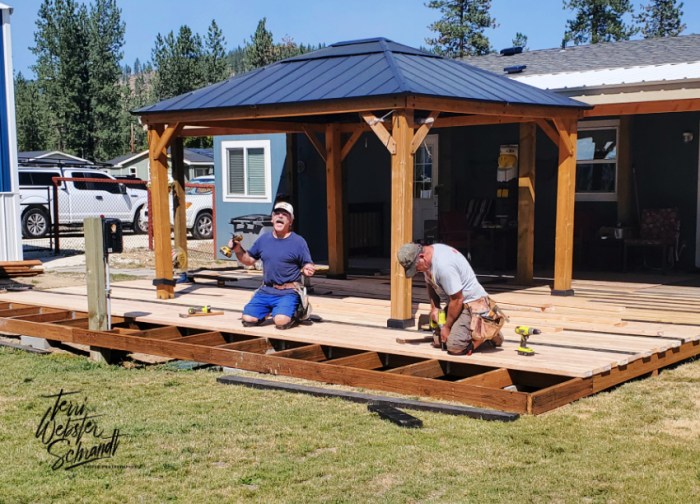 Two men building deck