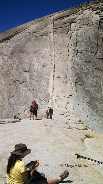 Line of climbers on Half Dome
