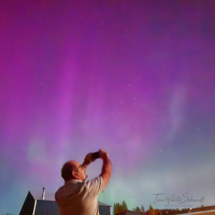 man in Northern lights