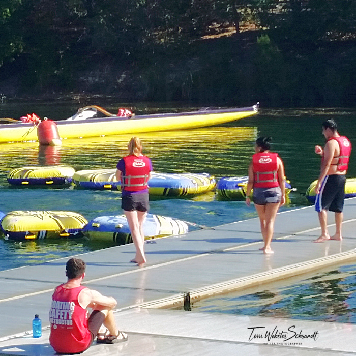 college students wearing life vests
