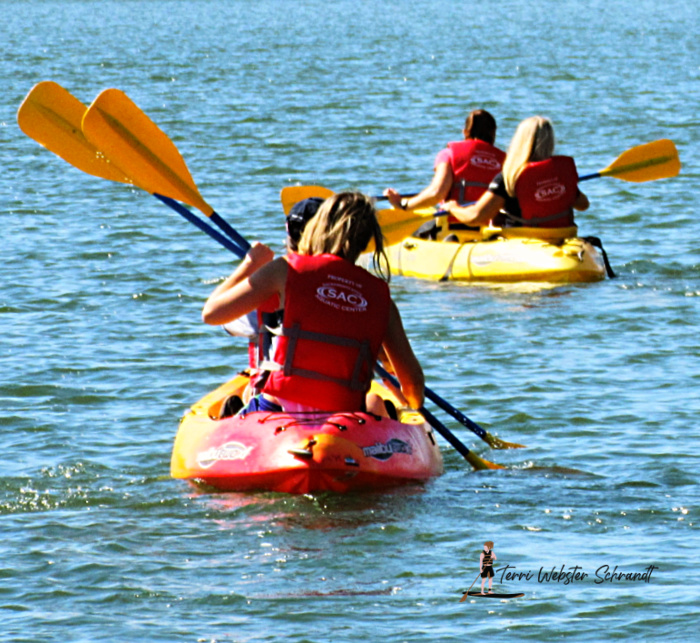 students kayaking