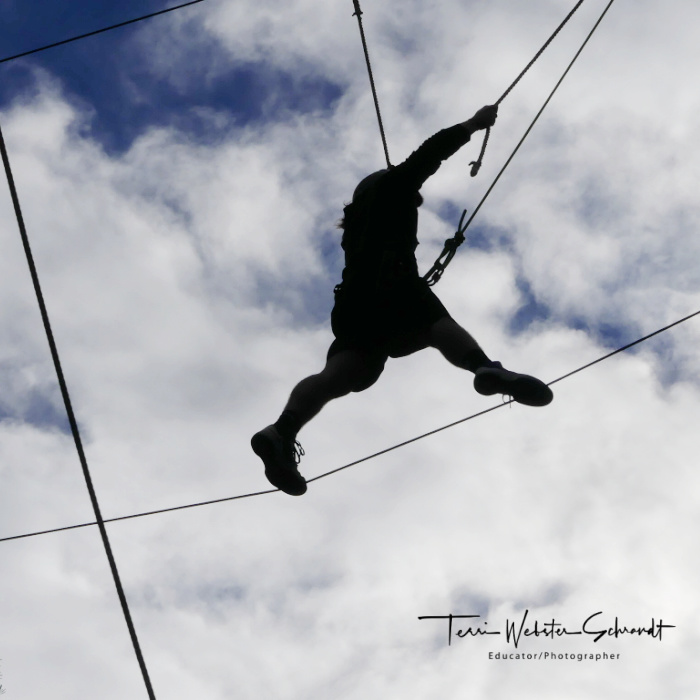 student on challenge course