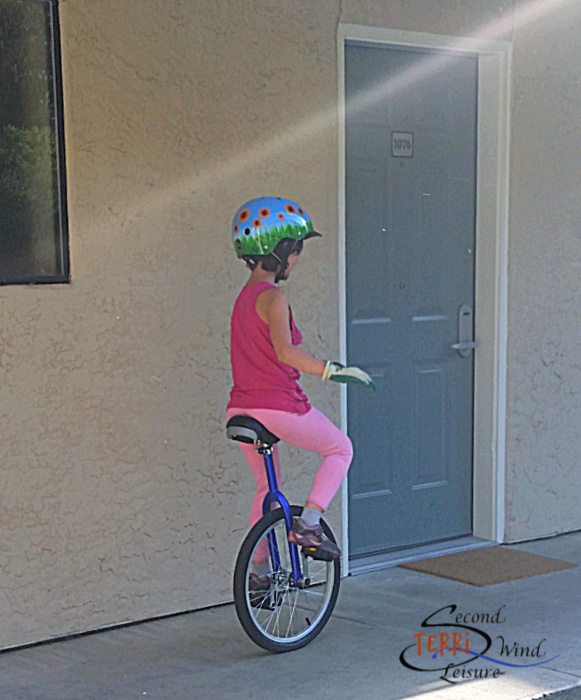 pink unicyclist